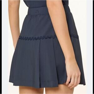 Varley Ayla Tennis Skirt Medium Blue under short pockets